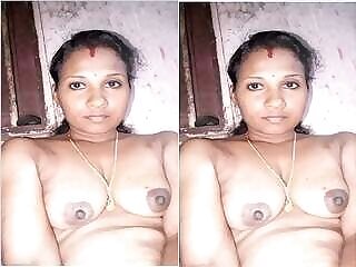 Horny Desi bhabhi shows off her pussy with big tits