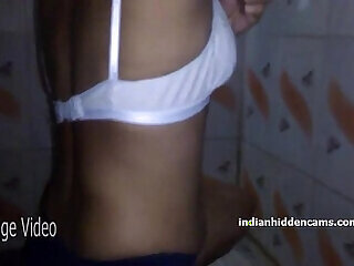 Desi village girl removing her armpit hair by razor in bathroom in bra panty