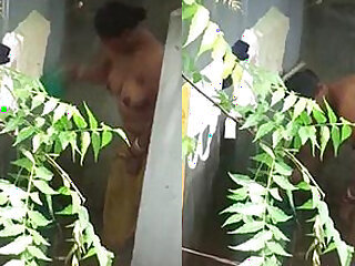 Big boobs Desi bhabhi nude bathing neighbor boy caught by hidden cam